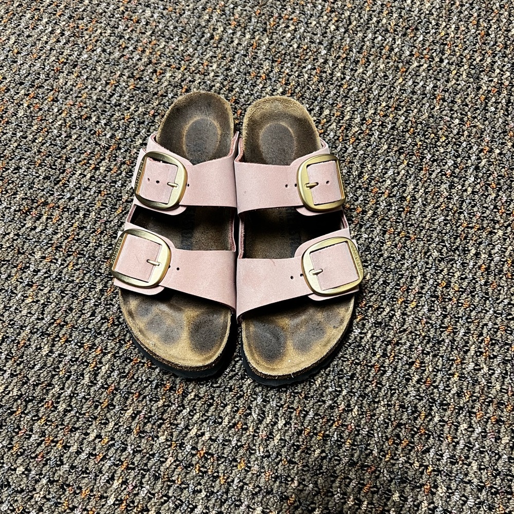 Women’s pastel pink Birkenstocks.